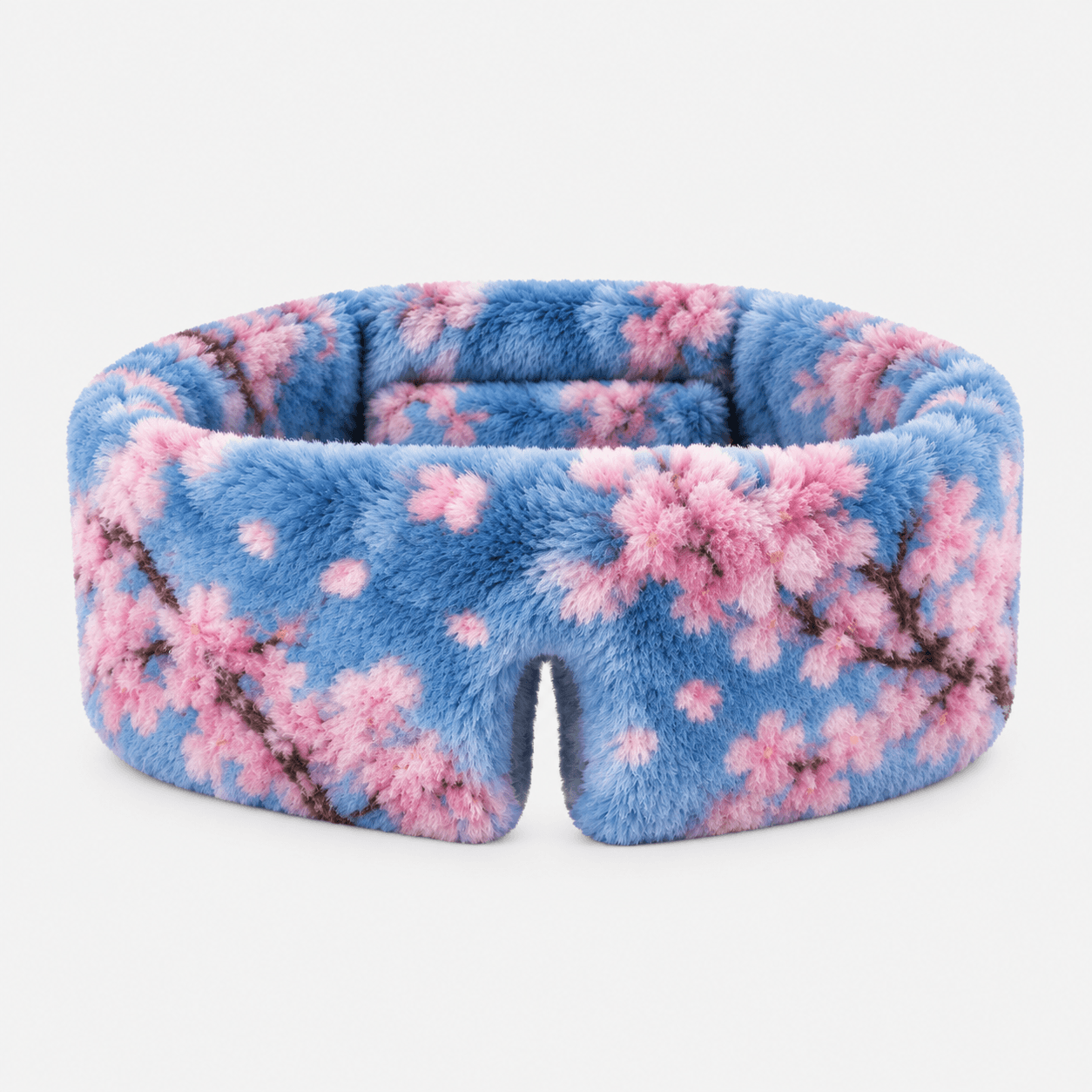 Pastel cherry-blossom plush silk sleep mask.